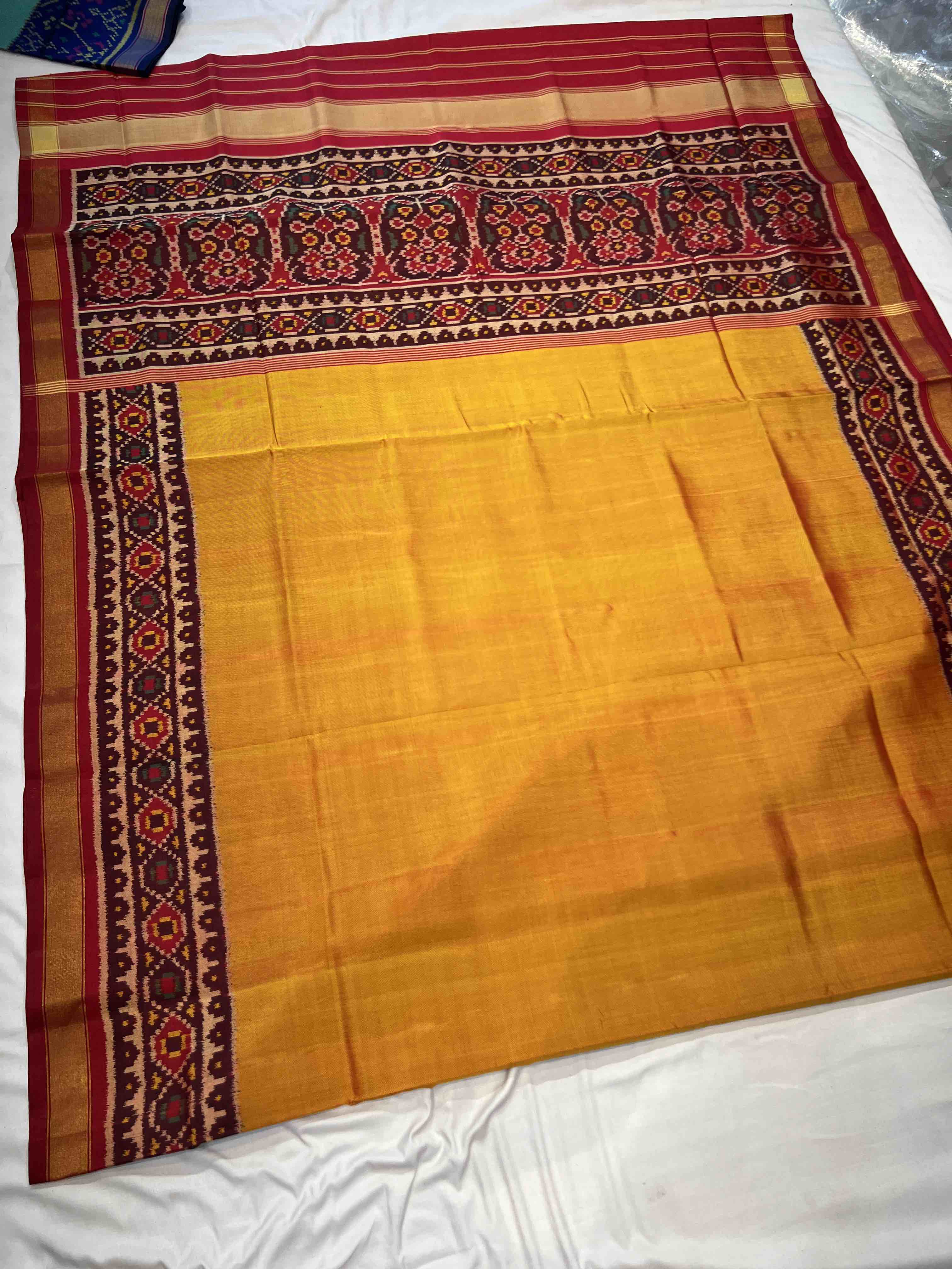 Mustard Plain Gala Border Handwoven Patola Silk Saree